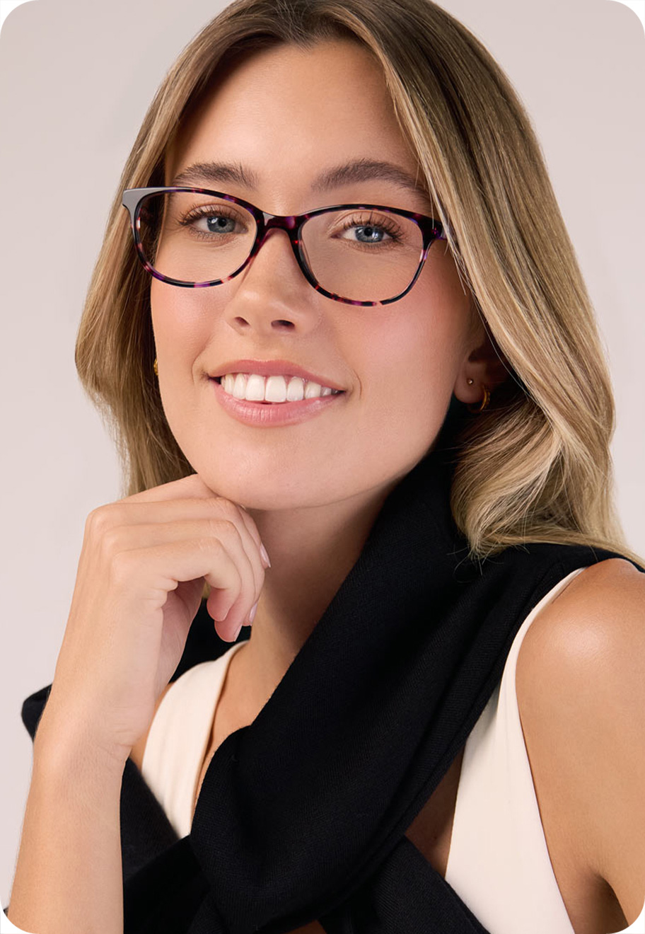 A model wearing Evie in Violet Tortoise.