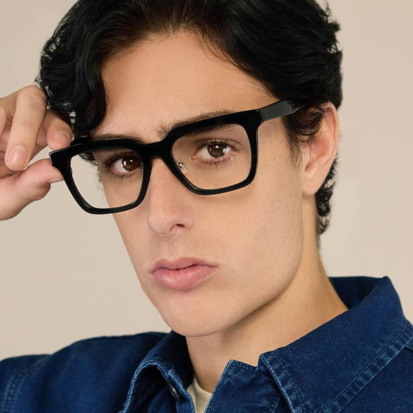 Model wearing Serge 2 optical frame in Obsidian Black