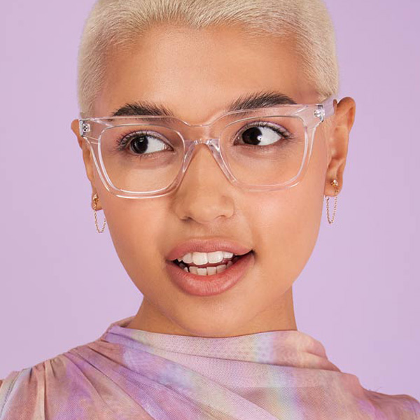 Model wearing Serge Small optical frame in Clear Crystal