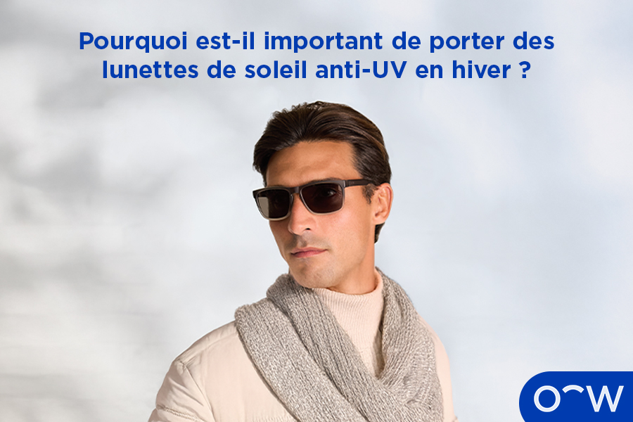 Une personne portant des vêtements d’hiver et des lunettes de
              soleil.