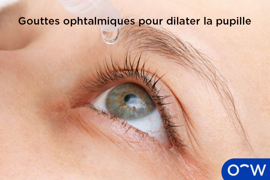 Une personne avec des collyres dilatants dans les yeux.