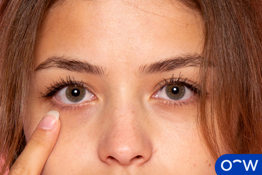 Pull down your lower lid slowly