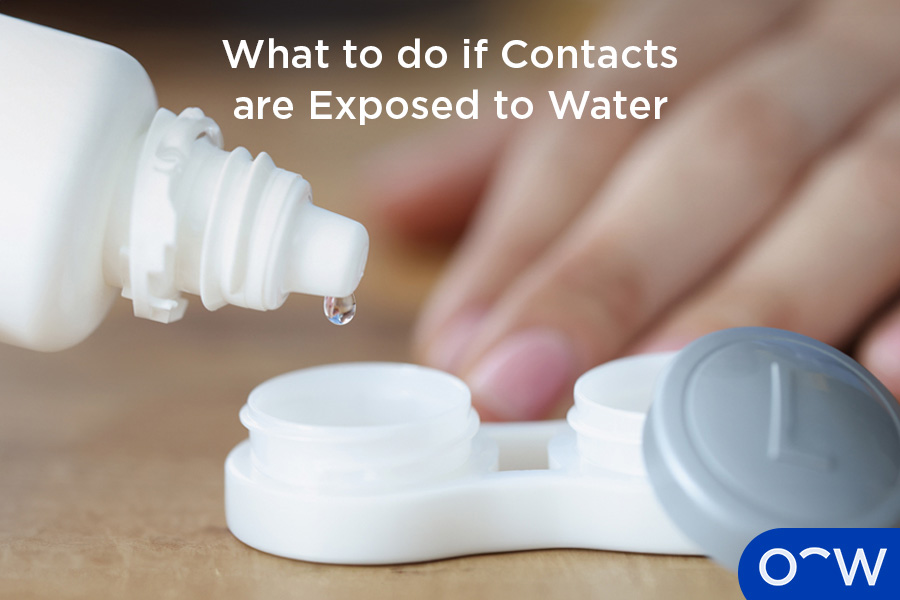 A person using contact lens solution to clean contacts after they have been exposed to water.