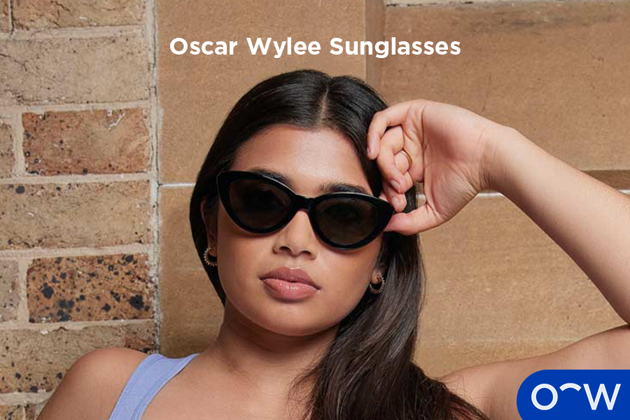 A woman wearing Oscar Wylee sunglasses