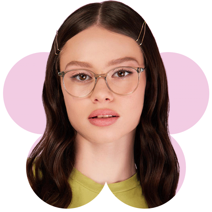 Female wearing Oscar Wylee CA Fr Frieda glasses in the colour Unicorn